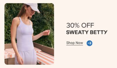 An image of a woman in a white activewear set and hat. 30% off SWEATY BETTY. Shop now.